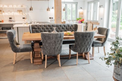 dark-grey-chair-around-dining-table